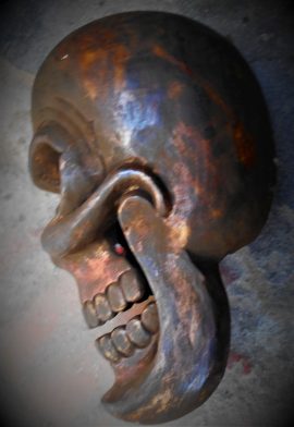 Antique Skull Statue