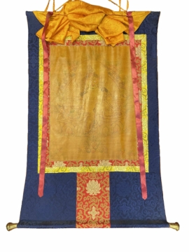 Thangka tibétain jaune de Jambhala encadré en soie