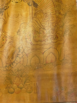 Thangka tibétain jaune de Jambhala encadré en soie