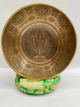 Avalokitesvara carved singing bowl