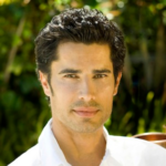 Yogi Cameron Alborzian is an Iranian-born British yoga and Ayurveda therapist and a former fashion model. After a successful career as male model in the fashion industry as the face of labels such as Guess, Levi's and Versace as well as a starring role in Madonna's "Express Yourself" video, he shifted his focus to work with people as an Ayurveda and yoga therapist. The Guru in You, his first book published in America, was released by HarperCollins in January 2011.