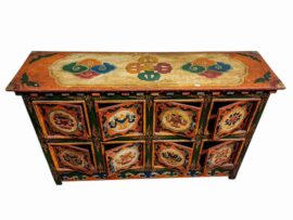 Cabinet en bois tibétain avec des symboles Ashtamangala