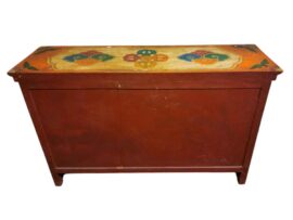 Cabinet en bois tibétain avec des symboles Ashtamangala