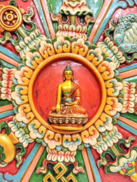Suspension murale en bois des Ashtamangala et du Bouddha