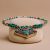 Handmade in Nepal by skilled artisans, this Inlaid Stone Pendant Necklace features a harmonious blend of Turquoise, Lapis Lazuli, and Coral, embodying healing and spiritual renewal for your journey.