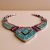 The Inlaid Stone Pendant Necklace, handmade in Nepal by skilled artisans, harmonizes white metal, turquoise, and coral, serving as a meaningful companion in your spiritual journey.
