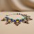Handmade in Nepal by skilled artisans, this Tibetan Stone Beaded Necklace features Lapis, Coral, Amber, and Turquoise, serving as a supportive companion on your spiritual journey.