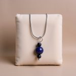 Discover the Lapis Stone Bead Chain Necklace, handmade in Nepal by skilled artisans. This piece embodies the essence of spirituality, enhancing inner truth and self-awareness.