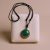 Discover the Jade Stone Pendant Necklace, a handmade talisman from Nepal, embodying tranquility and inner peace, designed by skilled artisans to enhance your spiritual journey.