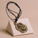 Handmade in Nepal by skilled artisans, this Ganesha pendant embodies the blessings of Lord Ganesha, serving as a meaningful reminder of wisdom, protection, and new beginnings.