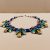 Handmade in Nepal by skilled artisans, this Inlaid Stone Pendant Necklace features healing gemstones, harmonizing your spirit while enhancing your journey toward balance and growth.