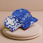 This Dark Blue Silk Mala Bag, handmade in Nepal by skilled artisans, is a sacred container for your mala beads, embodying wisdom and protection on your spiritual journey.