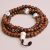 Handmade in Nepal by skilled artisans, this Japa Mala of Bodhi seeds and Conch Shell encourages wisdom and tranquility, guiding your spiritual journey and reminding you of life's impermanence.