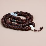 Handmade in Nepal by skilled artisans, this Antique One Eye Nepali Bodhi Seed Yoga Mala aids meditation, symbolizing spiritual insight and the sacred connection to Lord Buddha's teachings.