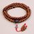 Handmade in Nepal by skilled artisans, this Antique Raktu seed Japa Mala supports meditation and mantra recitation, fostering awareness and blessings from Lord Buddha.