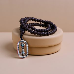 Raktu Seed Mala with White Metal Dorje