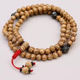 This handmade mala, crafted by skilled artisans in Nepal, embodies the Lotus's purity and supports spiritual growth, enhancing fortune and clarity on your path.