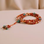 This handmade 6 mm Fire Agate Stone Mala, crafted in Nepal by skilled artisans, embodies courage and vitality, enhancing spiritual protection and igniting inner strength for transformative journeys.