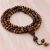 Handmade in Nepal by skilled artisans, this Bodhi Tiger Eye stone prayer mala embodies protection and spiritual strength, supporting your journey of meditation and connection to the divine.