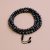 Handmade in Nepal by skilled artisans, this Black Tiger Eye Stone Japa Mala is a sacred tool for meditation, fostering grounding, protection, and clarity on your spiritual journey.