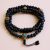 Handmade in Nepal by skilled artisans, this Lava Stone Prayer Mala aids in emotional balance and transformation, serving as a meaningful companion in your spiritual practice.