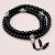 Handmade in Nepal by skilled artisans, this Black Onyx Stone Prayer Mala features 108 beads, supporting your meditation and mantra recitation on the path to spiritual awakening.