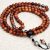 The Tibetan Mantra Bayong Wood Japa Mala, handmade by skilled artisans in Nepal, serves as a sacred tool for mantra recitation, promoting spiritual clarity and purification of the mind, body, and spirit.