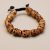 Handmade in Nepal by skilled artisans, the Calming Skull Stone Wrist Mala symbolizes impermanence, guiding us toward inner peace and clarity amidst the transient nature of existence.