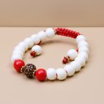 This handmade wrist mala, crafted from yak bone in Nepal by skilled artisans, serves as a reminder to embrace compassion and mindfulness on our spiritual journey.