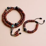 This handmade Fossil Yak Bone Wrist Mala and Bracelet set, crafted by skilled artisans in Nepal, inspires mindfulness and compassion, reminding us of the beauty in life's impermanence.