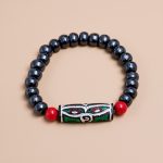 Wisdom Buddha Eye Yak Bone Wrist Mala/Bracelet, handmade in Nepal by skilled artisans, serves as a reminder of impermanence and a companion for meditation and reflection.