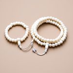 Yak Bone Japa Mala and Wrist Mala Set, handmade in Nepal by skilled artisans, serves as a powerful tool for meditation, embodying the essence of impermanence and connection to nature.