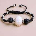 Handmade in Nepal by skilled artisans, this conch shell wrist mala bracelet serves as a powerful reminder of sacred sound and mindfulness on your spiritual journey.