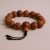 Bodhi seed wrist mala, handmade in Nepal by skilled artisans, offers spiritual grounding and clarity, fostering meditation and emotional balance as you connect with the essence of Vajrayana Buddhism.