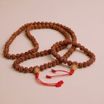 Brown Rudraksha Seed Japa Mala and Wrist Mala/Bracelet Set, handmade in Nepal by skilled artisans, fosters spiritual connection and balance, enriching your Vajrayana practice with each bead.