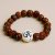 Inlay Indian Bodhi Wrist Mala, handmade in Nepal by skilled artisans, symbolizes the wisdom of the Bodhi Tree, guiding your meditation and enhancing your spiritual journey.