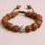 This Rudraksha Bead Wrist Mala, handmade in Nepal by skilled artisans, embodies the five aspects of Lord Shiva, serving as a potent aid for meditation and spiritual practice.