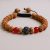 Handmade in Nepal by skilled artisans, this wrist mala features five-faced rudraksha seeds and Tibetan mantra beads, serving as a sacred tool for spiritual connection and inner peace.