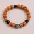 Handmade in Nepal by skilled artisans, this 5 Faces Rudraksha Seed Wrist Mala serves as a sacred tool, promoting inner peace and grounding on your spiritual journey.
