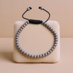 Handmade in Nepal by skilled artisans, this 4 MM Hematite Stone Wrist Mala serves as a grounding companion for meditation and daily wear, promoting emotional stability and focus.