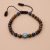 Handmade in Nepal by skilled artisans, this 6 MM Tiger Eye Stone bracelet serves as a protective talisman, guiding you toward positive energies and spiritual well-being.
