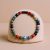 This 6MM Bloodstone Adjustable Wrist Mala, handmade in Nepal by skilled artisans, embodies the essence of Vajrayana Buddhism, promoting vitality and dispelling negative energies in daily practice.