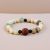 Antique Bodhi Amazonite Stone Wrist mala, handmade in Nepal by skilled artisans, serves as a grounding tool for meditation, fostering emotional balance and guiding you on your spiritual path.