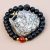 Black Onyx Stone Wrist Mala, handcrafted in Nepal by skilled artisans, serves as a powerful tool for meditation, fostering inner strength and emotional clarity on your spiritual journey.