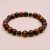 Handmade in Nepal by skilled artisans, this Black Onyx Tiger Eye stone wrist mala fosters spiritual growth, balance, and resilience, enhancing your journey toward mindfulness and inner strength.