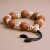 The Bodhi Seed & Skull Wrist Mala, handmade in Nepal by skilled artisans, serves as a reminder of life's impermanence, enhancing awareness and tranquility on your spiritual journey.