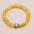 Handmade in Nepal by skilled artisans, this Citrine Stone Wrist Mala features a lion head spacer, symbolizing courage and abundance on your spiritual journey.