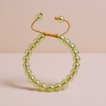 Citrine Stone Wrist Mala, handmade in Nepal by skilled artisans, embodies the energy of abundance and positivity, guiding you on your spiritual journey toward joy and creativity.