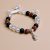 Handmade in Nepal by skilled artisans, this crystal stone wrist mala features a Buddha charm, serving as a reminder of mindfulness and emotional healing on your spiritual journey.