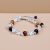Handmade in Nepal by skilled artisans, this wrist mala combines clear quartz and tiger eye, fostering clarity, confidence, and a deeper connection to your spiritual journey.